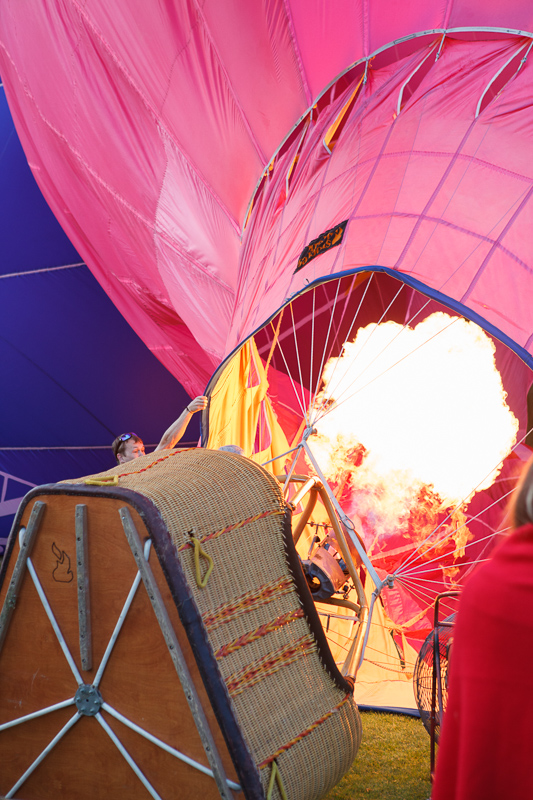 Fire filling the Bank of American Fork Pink Pig hot air balloon.